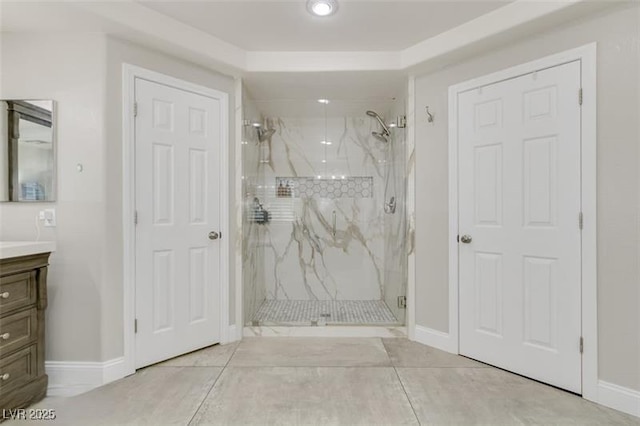 bathroom with vanity and walk in shower