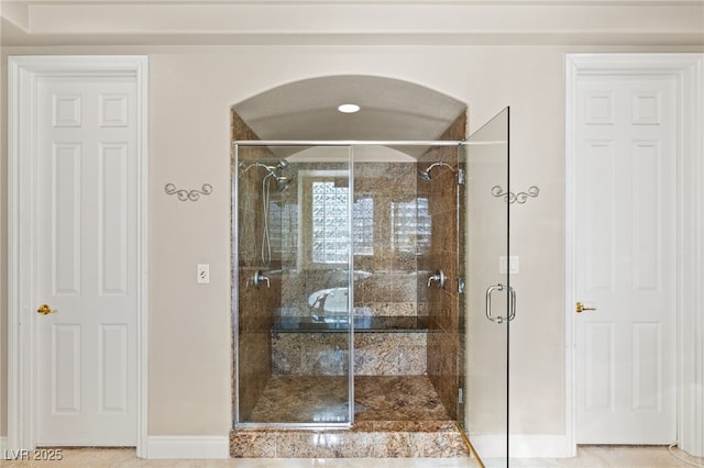 bathroom with an enclosed shower