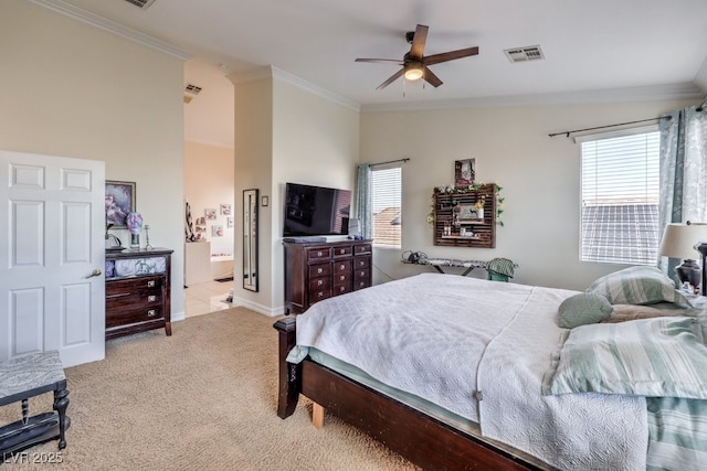 carpeted bedroom featuring ceiling fan, ornamental molding, vaulted ceiling, and connected bathroom