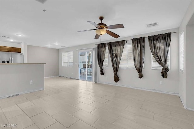 empty room featuring ceiling fan