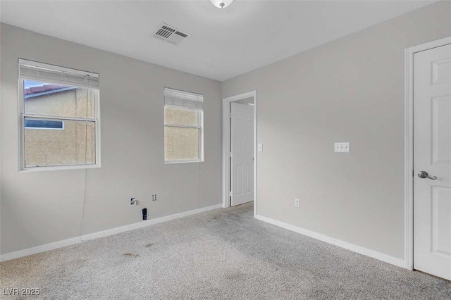 view of carpeted spare room