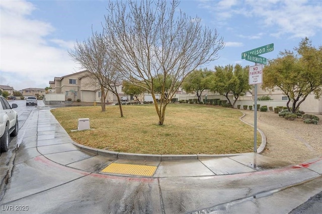 view of home's community featuring a yard