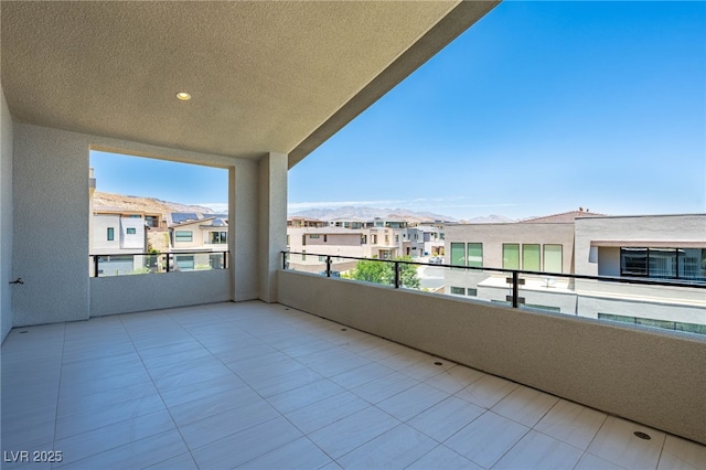 balcony featuring a mountain view