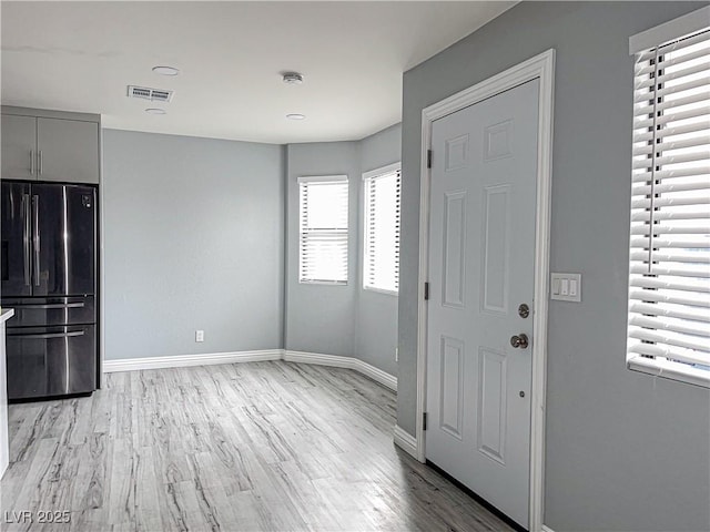 foyer featuring light hardwood / wood-style floors