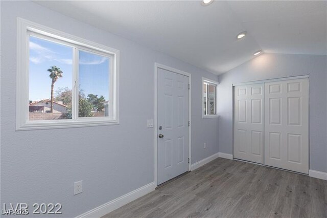 5816 W Cherokee Ave, Las Vegas, NV 89103 - foyer with hardwood / wood-style flooring and vaulted ceiling