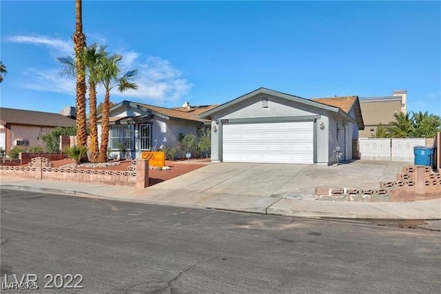 ranch-style home with a garage