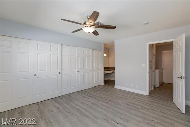 5816 W Cherokee Ave, Las Vegas, NV 89103 - unfurnished bedroom featuring ceiling fan, a closet, ensuite bath, and light hardwood / wood-style flooring