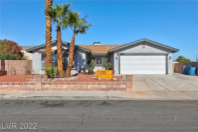 5816 W Cherokee Ave, Las Vegas, NV 89103 - ranch-style house featuring a garage