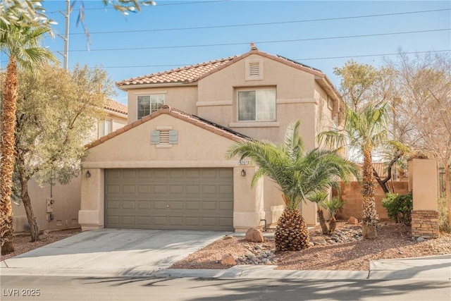 mediterranean / spanish-style home featuring a garage