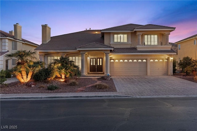 view of front of property featuring a garage