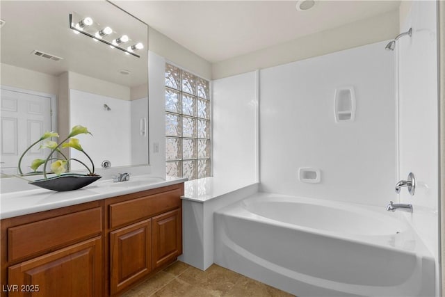 4439 Melrose Abbey Pl, Las Vegas, NV 89141 - full bathroom featuring vanity, tile patterned floors, and shower / washtub combination