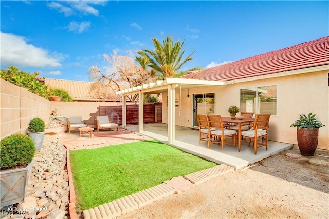 view of yard featuring a patio area and a fenced backyard