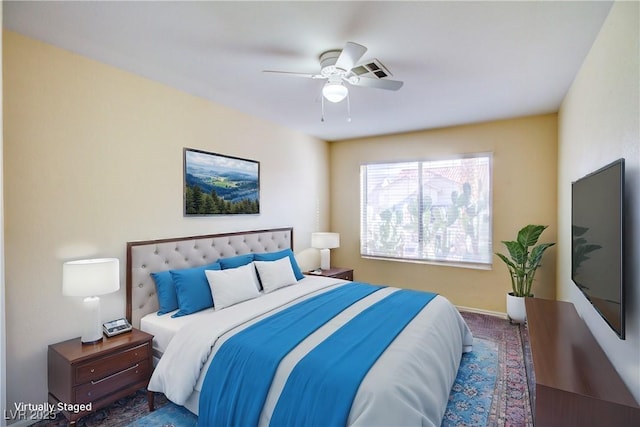 bedroom featuring baseboards, carpet floors, and ceiling fan