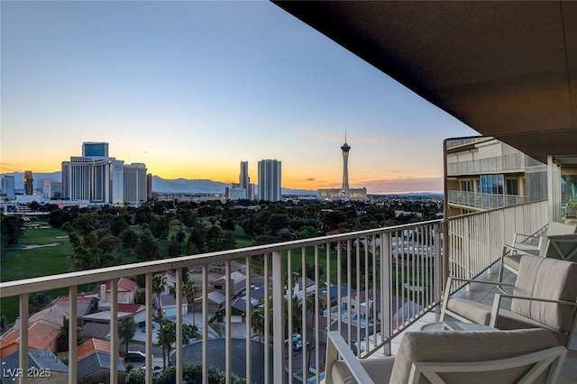 view of balcony at dusk