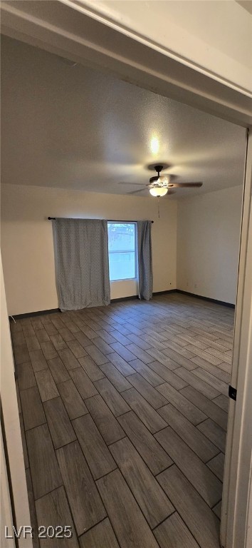 empty room featuring ceiling fan