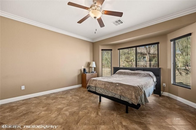 bedroom with ceiling fan and crown molding