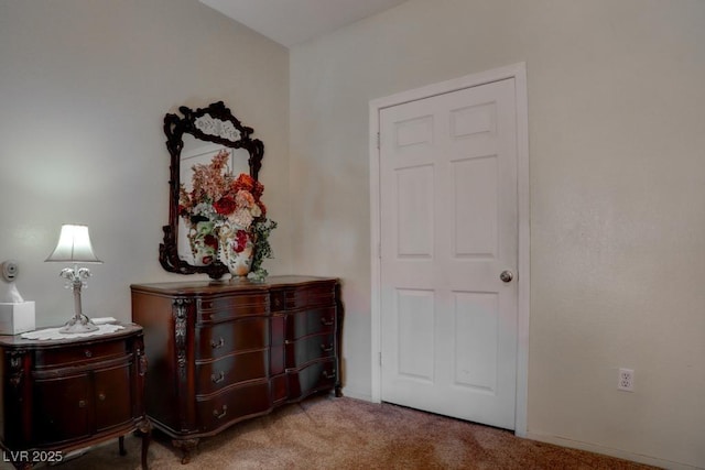 bedroom featuring light colored carpet