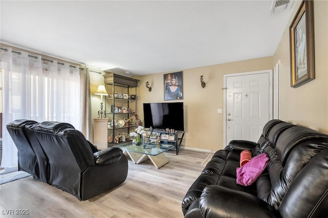 living room featuring light hardwood / wood-style flooring