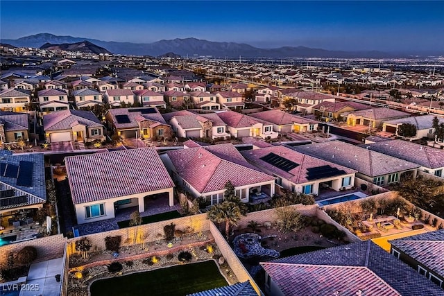 drone / aerial view featuring a mountain view