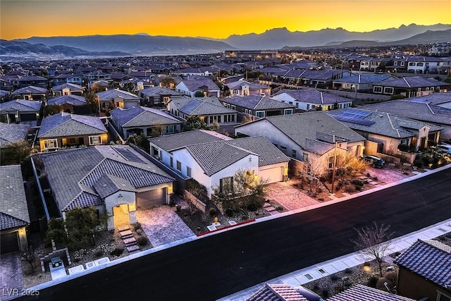 aerial view at dusk with a mountain view