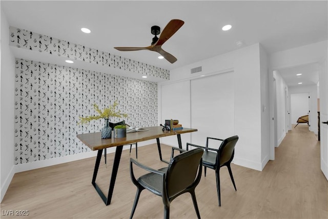 office area with ceiling fan and light hardwood / wood-style flooring