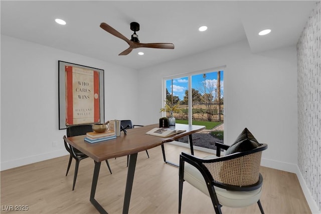 office area with ceiling fan and light hardwood / wood-style floors