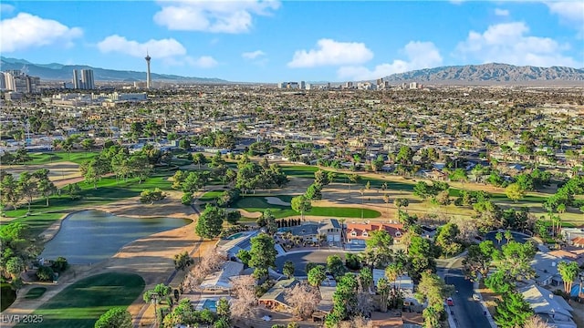 birds eye view of property featuring a mountain view