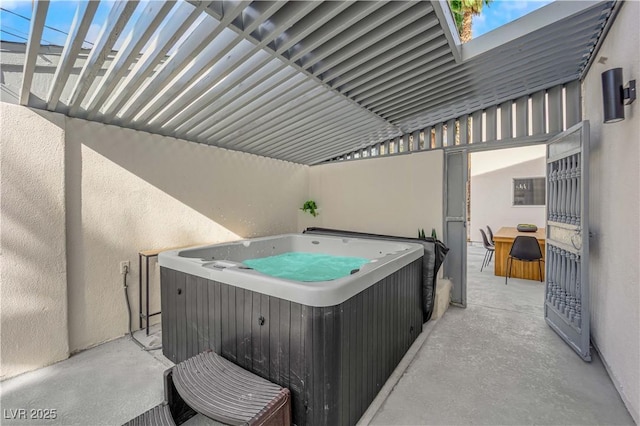 view of patio / terrace featuring a hot tub