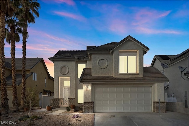 view of front of home with a garage