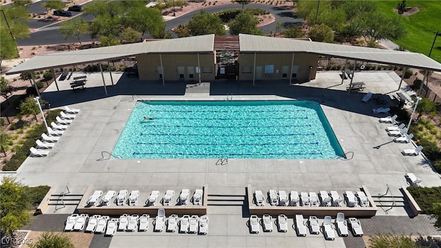 view of swimming pool with a patio