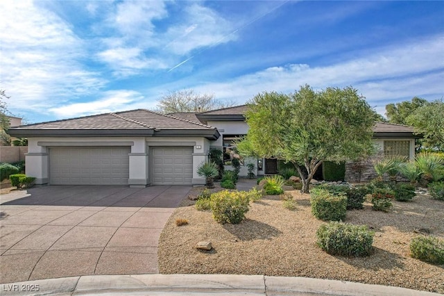 view of front of property with a garage