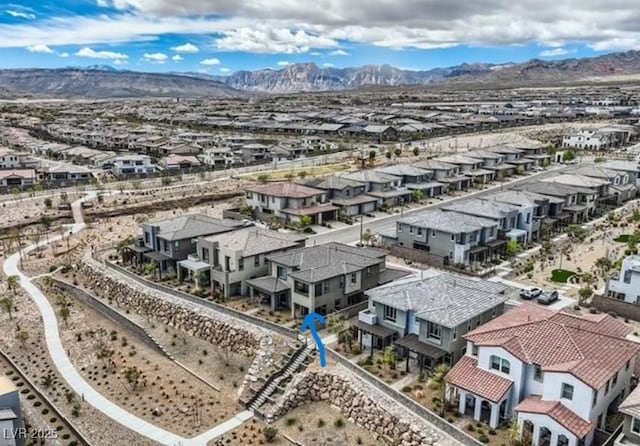 bird's eye view with a mountain view and a residential view