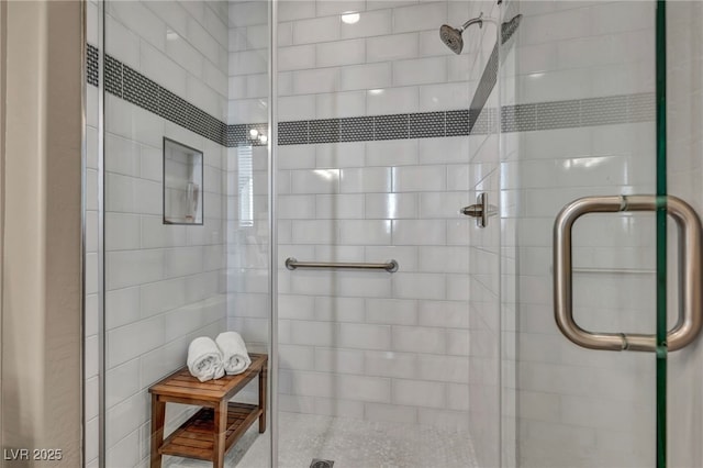 full bath with a shower stall