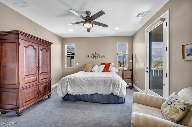 bedroom with visible vents, baseboards, carpet flooring, and access to outside