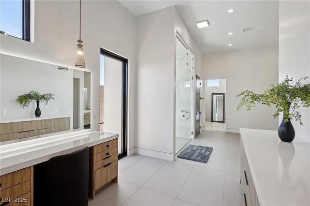 bathroom with tile patterned floors