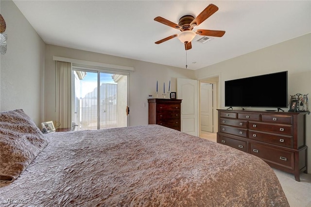 carpeted bedroom with ceiling fan and access to outside