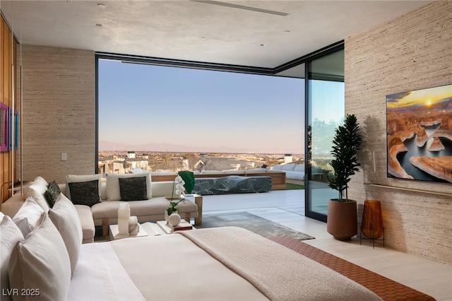 bedroom featuring expansive windows