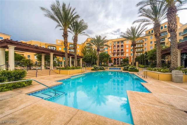 view of pool featuring a patio