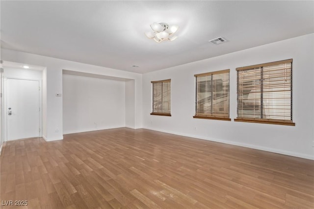 empty room featuring light hardwood / wood-style floors