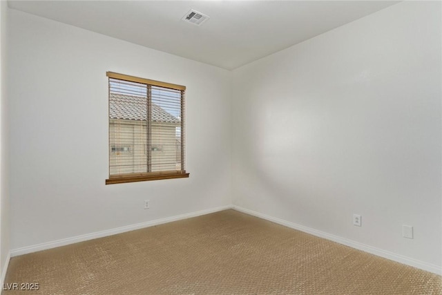 unfurnished room featuring carpet floors