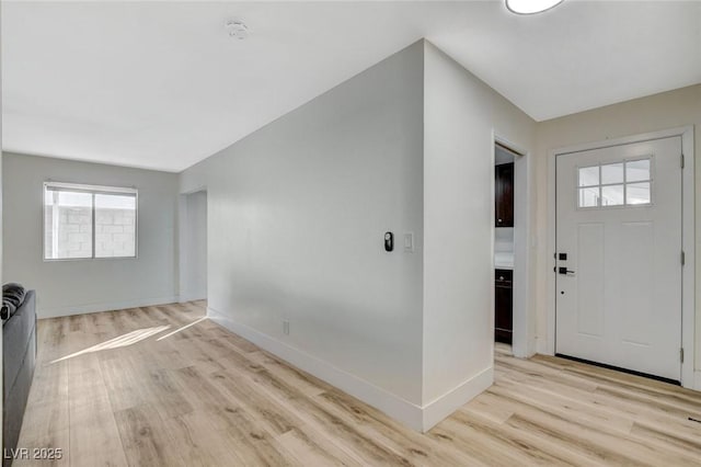 foyer entrance featuring light wood-type flooring