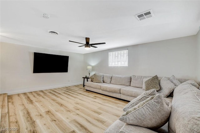 unfurnished living room with light hardwood / wood-style flooring and ceiling fan