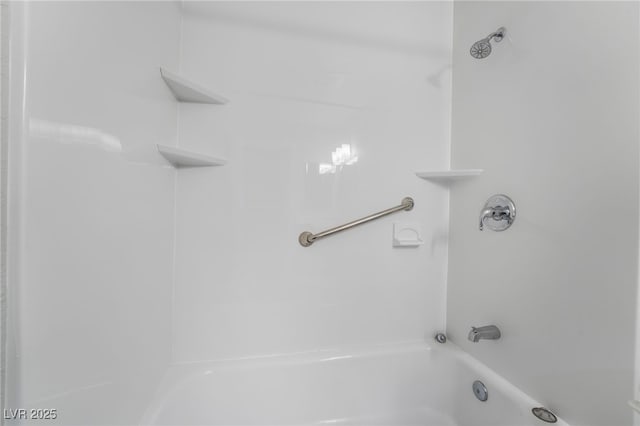 bathroom featuring washtub / shower combination