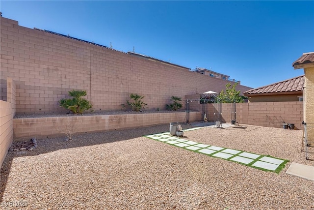 view of yard featuring a fenced backyard