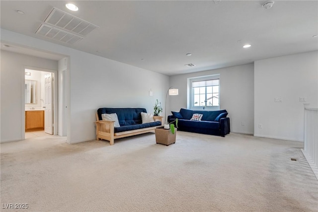 living room featuring light carpet, visible vents, recessed lighting, and baseboards