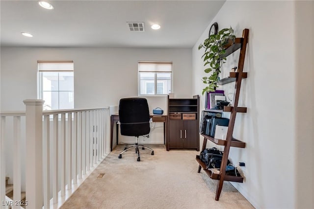 office space with recessed lighting, visible vents, and light colored carpet