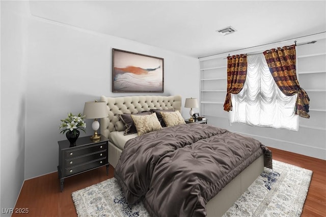 1301 E St Louis Ave Unit C, Las Vegas, NV 89104 - bedroom featuring wood finished floors and baseboards