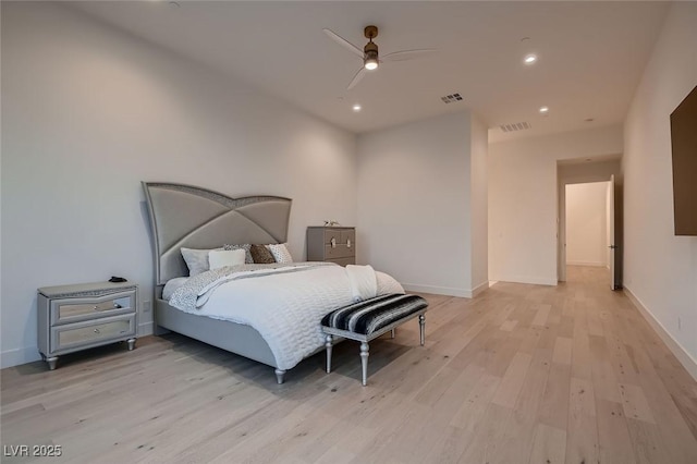 bedroom featuring visible vents, recessed lighting, light wood-type flooring, and baseboards