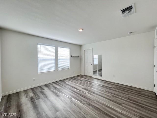 empty room featuring hardwood / wood-style floors