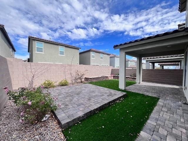 view of yard with a patio area